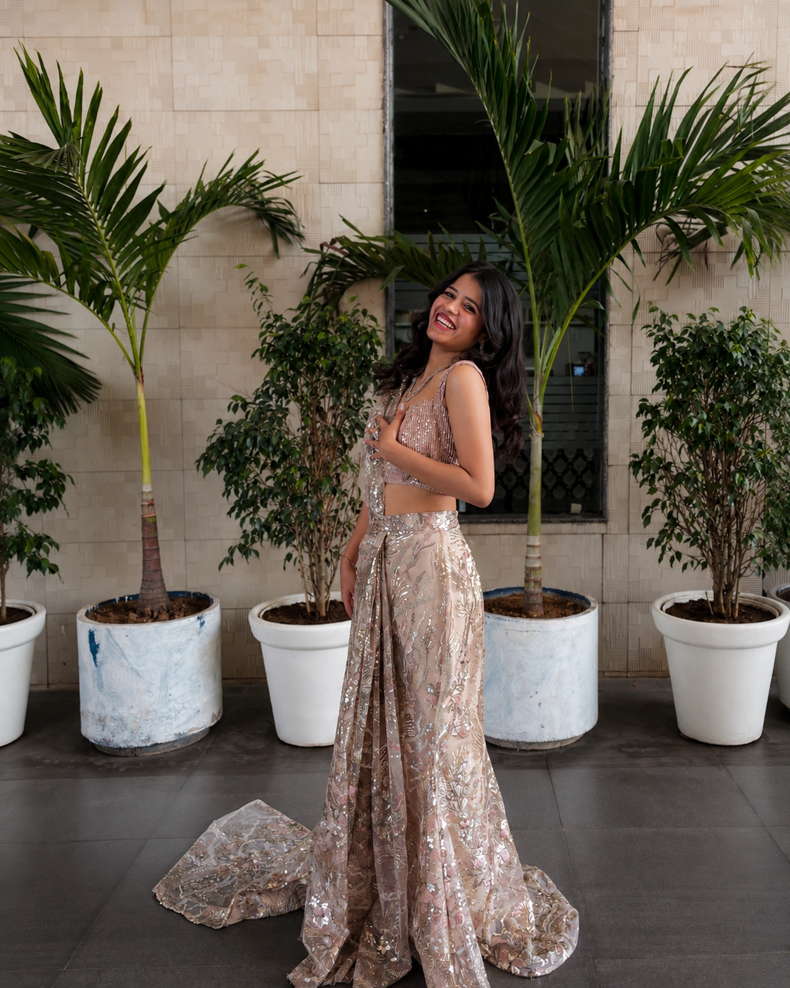 Customer wearing a custom outfit by Outfits by Deepshikhaa