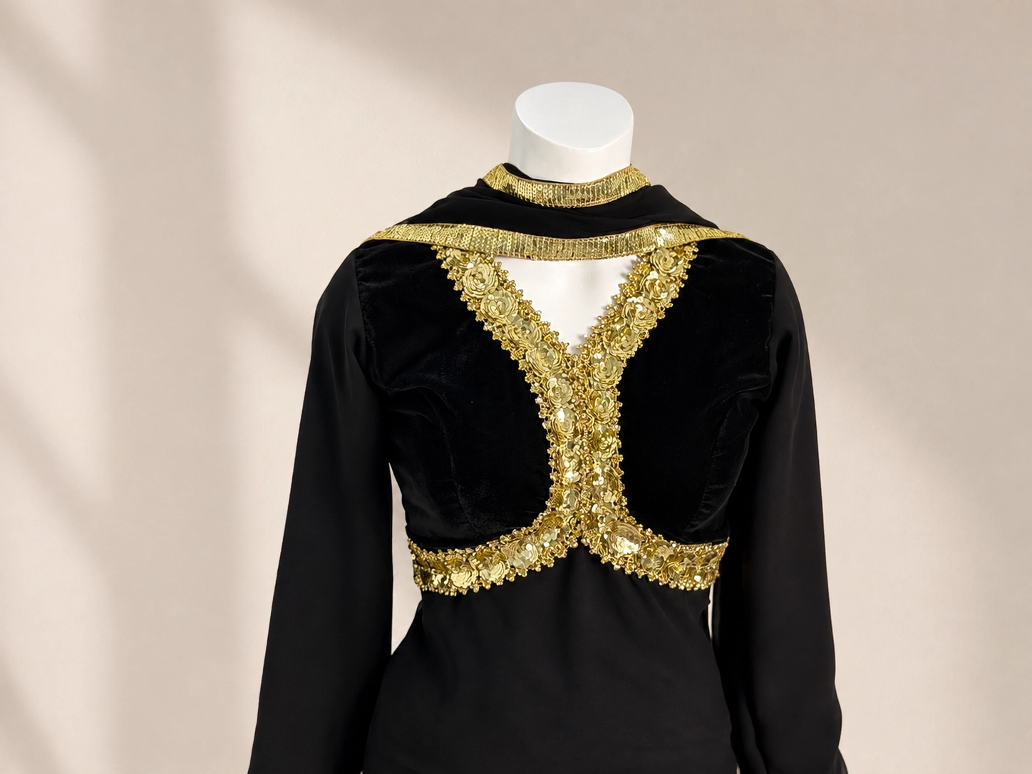 close up of shantipriya elegant black velvet-style suit